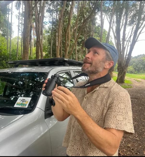 Clayton Smith — birding guide with binoculars